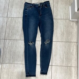 Women's Distressed Blue Jeans